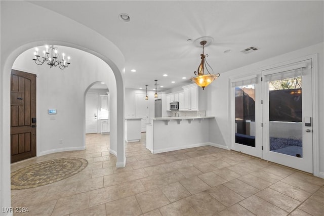 interior space with an inviting chandelier