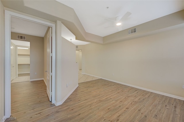 unfurnished room featuring ceiling fan and light hardwood / wood-style flooring