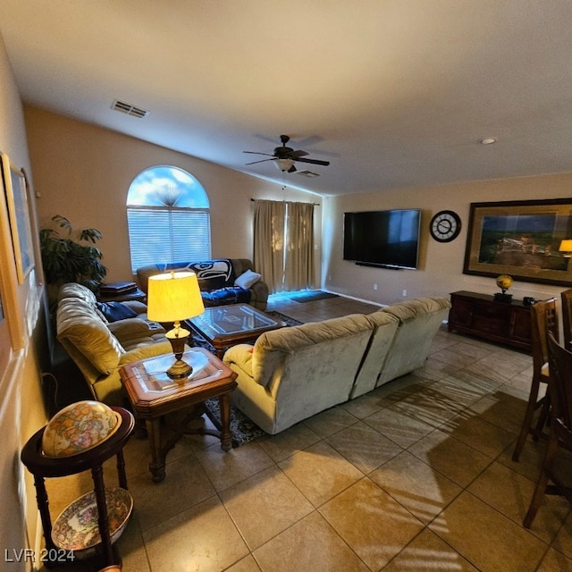 living room featuring tile patterned flooring and ceiling fan