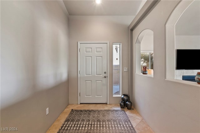 view of tiled foyer entrance