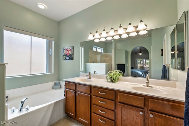 bathroom featuring separate shower and tub, ceiling fan, tile patterned floors, and vanity