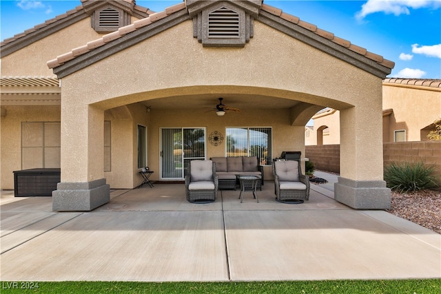 view of patio with ceiling fan and an outdoor hangout area