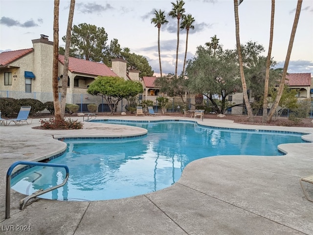 view of swimming pool featuring a patio