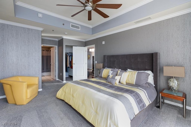 8255 Las Vegas Blvd Unit 2002, Las Vegas, NV 89123 - bedroom with carpet floors, ornamental molding, a spacious closet, baseboards, and connected bathroom