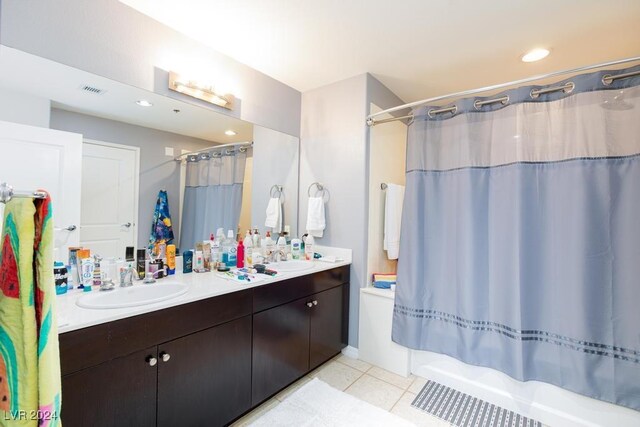 8255 Las Vegas Blvd Unit 2002, Las Vegas, NV 89123 - bathroom with double vanity, tile patterned flooring, shower / tub combo with curtain, and recessed lighting