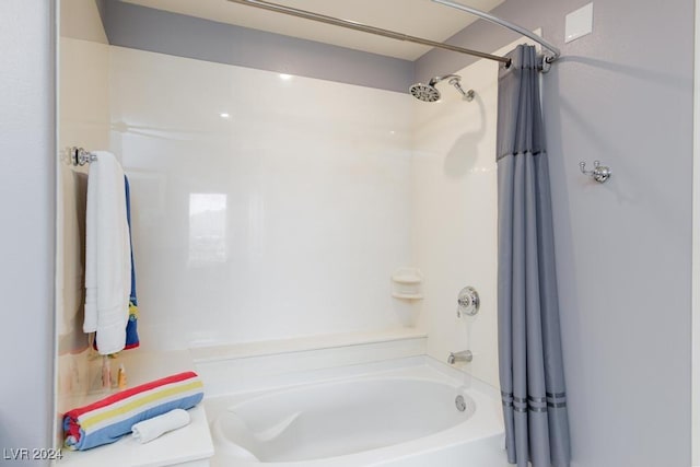 8255 Las Vegas Blvd Unit 2002, Las Vegas, NV 89123 - bathroom featuring shower / bath combo with shower curtain