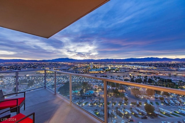 balcony at dusk with a mountain view