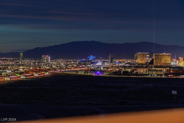 8255 Las Vegas Blvd Unit 2002, Las Vegas, NV 89123 - city view featuring a mountain backdrop and a view of city lights
