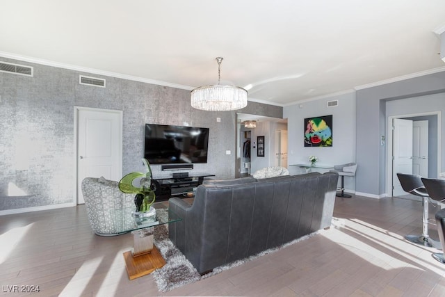 8255 Las Vegas Blvd Unit 2002, Las Vegas, NV 89123 - living area featuring a chandelier, baseboards, wood finished floors, and ornamental molding