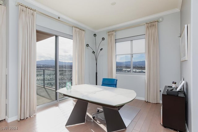 8255 Las Vegas Blvd Unit 2002, Las Vegas, NV 89123 - home office featuring a mountain view, crown molding, light wood-type flooring, and baseboards
