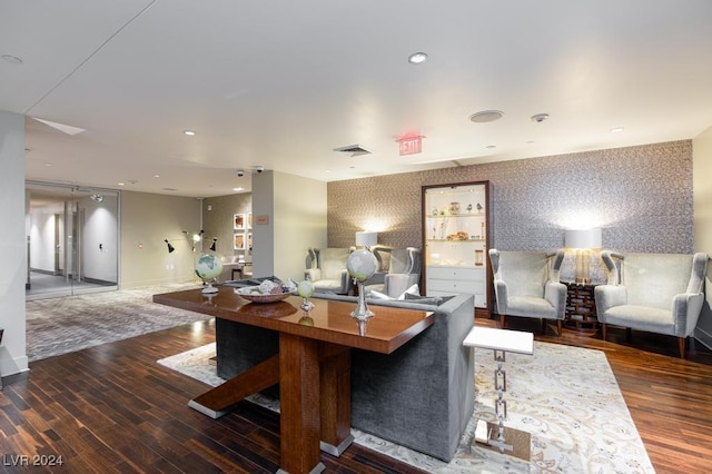 8255 Las Vegas Blvd Unit 2002, Las Vegas, NV 89123 - living room with wood finished floors, wallpapered walls, an accent wall, and baseboards
