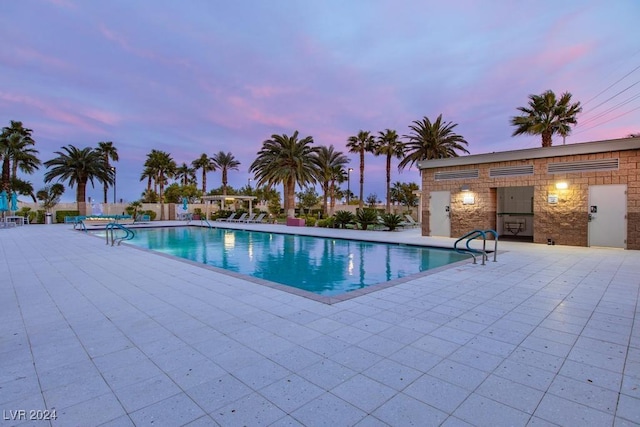 8255 Las Vegas Blvd Unit 2002, Las Vegas, NV 89123 - pool at dusk with a patio and a community pool