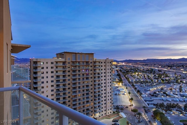 8255 Las Vegas Blvd Unit 2002, Las Vegas, NV 89123 - balcony at dusk featuring a mountain view and a view of city