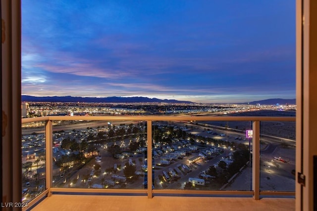 8255 Las Vegas Blvd Unit 2002, Las Vegas, NV 89123 - balcony at dusk featuring a mountain view