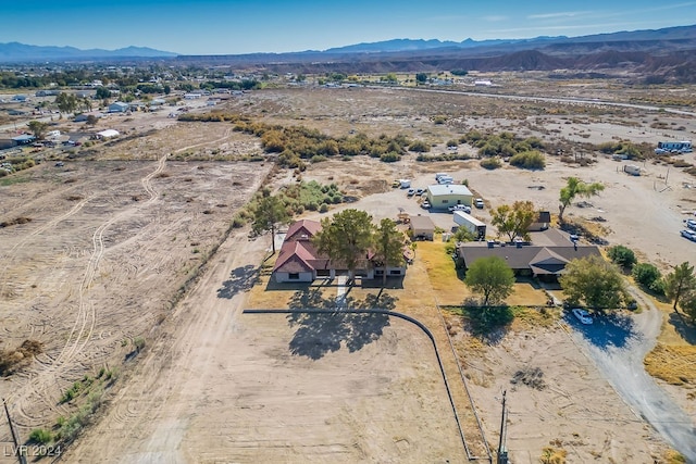 drone / aerial view featuring a mountain view