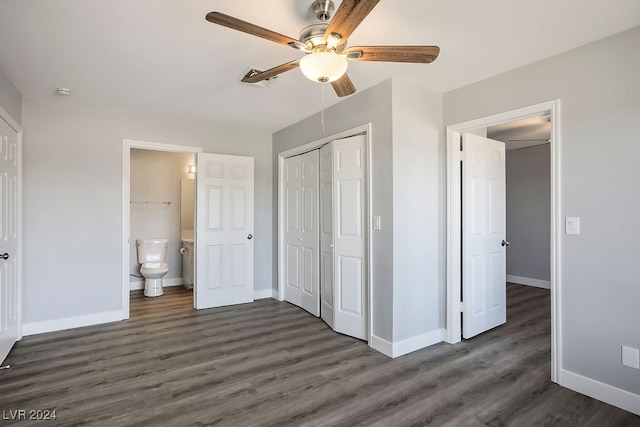 unfurnished bedroom featuring dark hardwood / wood-style flooring, a closet, ceiling fan, and connected bathroom