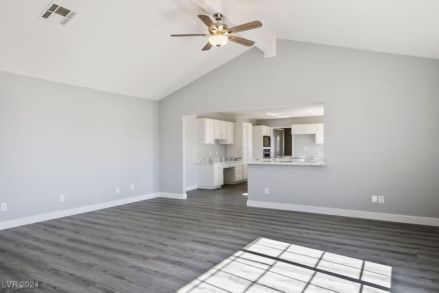 unfurnished living room with beamed ceiling, dark hardwood / wood-style floors, high vaulted ceiling, and ceiling fan