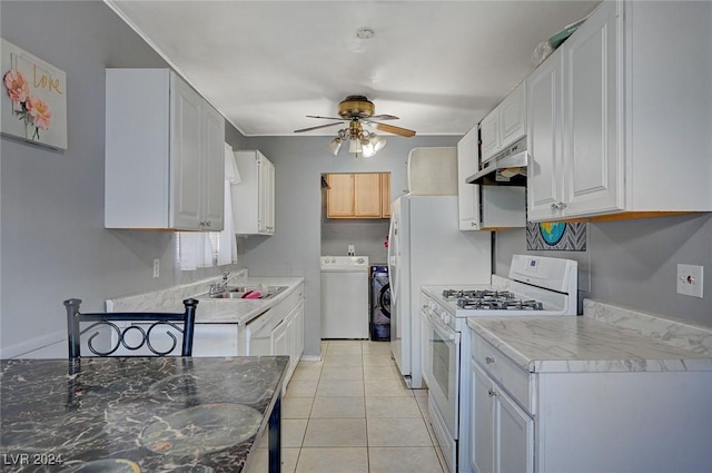 kitchen featuring white cabinetry, sink, ceiling fan, washer / dryer, and white gas range oven