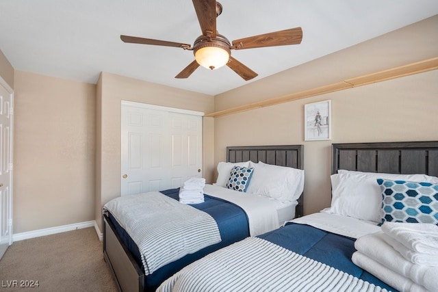 bedroom with light carpet, a closet, and ceiling fan