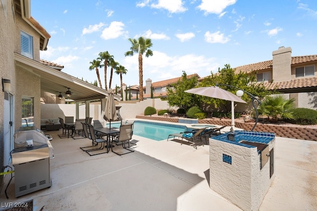 view of pool featuring a patio