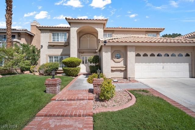 mediterranean / spanish-style house with a front lawn