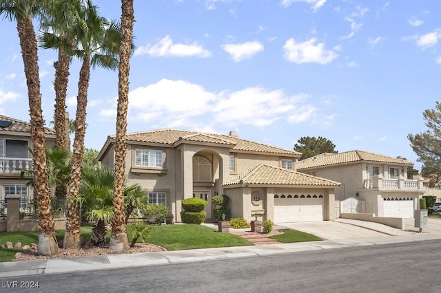 mediterranean / spanish-style home featuring a garage