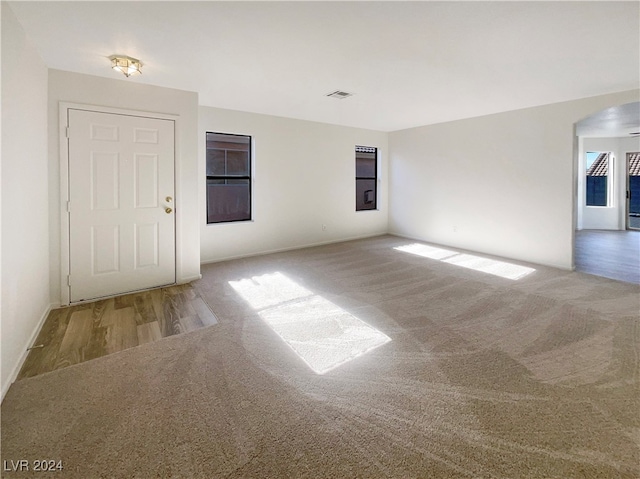 unfurnished room featuring hardwood / wood-style floors