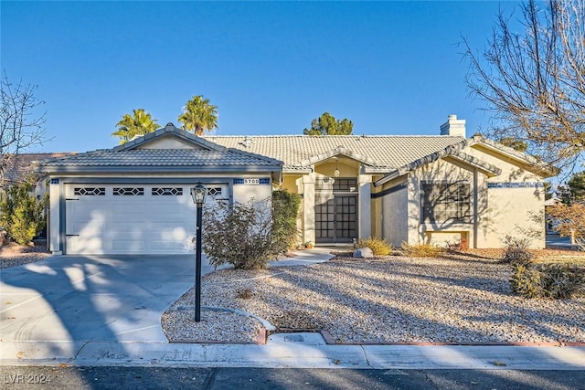 view of front of home with a garage