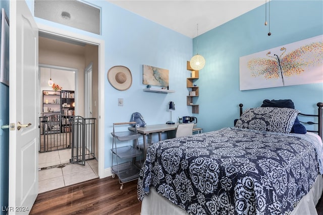 bedroom featuring wood-type flooring