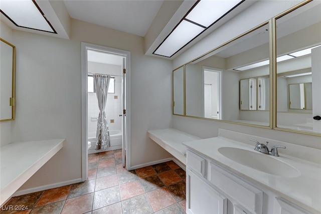 full bathroom with vanity, toilet, and shower / bathtub combination with curtain