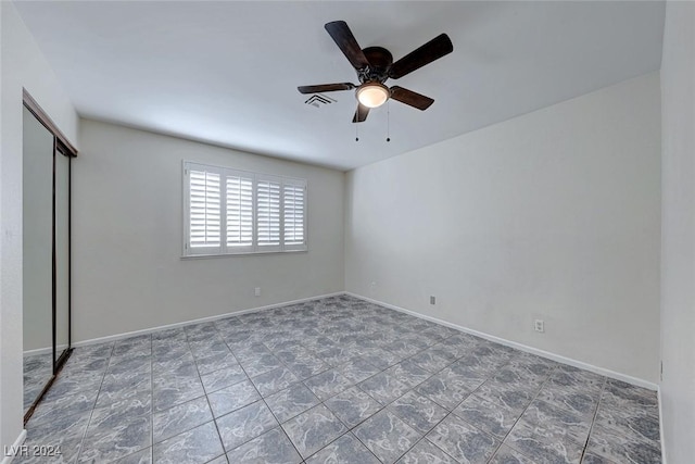 unfurnished bedroom with ceiling fan