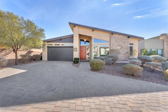 contemporary house featuring a garage