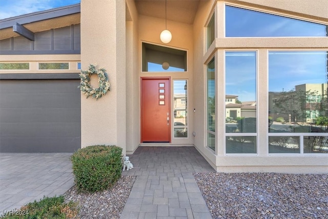 entrance to property featuring a garage