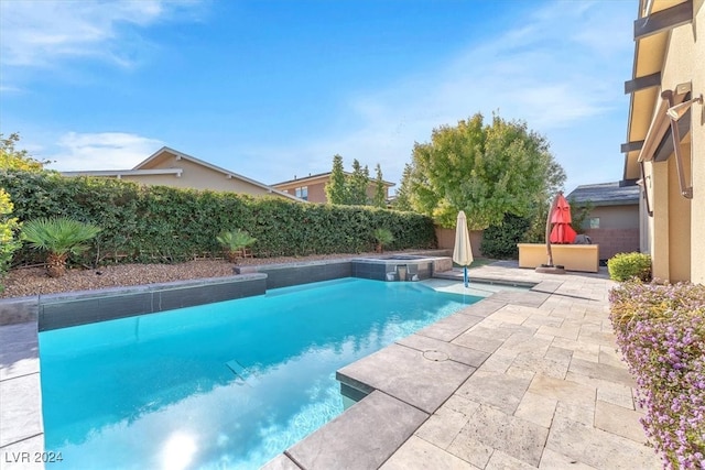 view of swimming pool featuring a patio