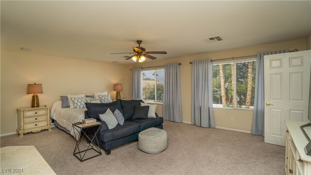 carpeted bedroom featuring ceiling fan