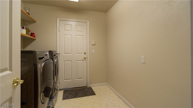 laundry area with washer and clothes dryer