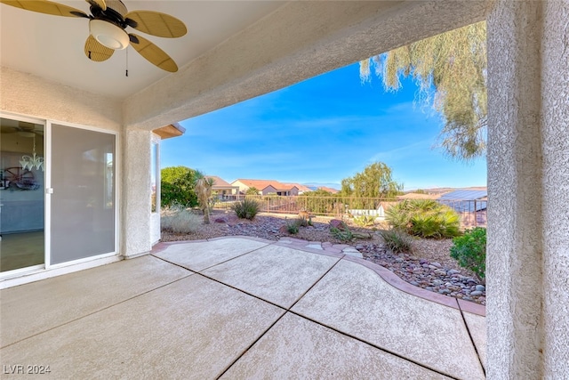 view of patio / terrace featuring ceiling fan