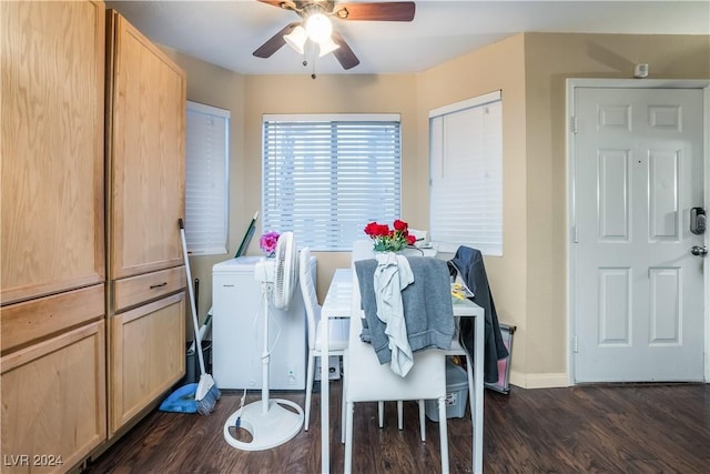 dining area featuring ceiling fan and dark hardwood / wood-style flooring