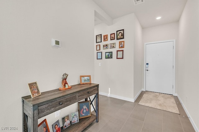 foyer entrance featuring tile patterned floors