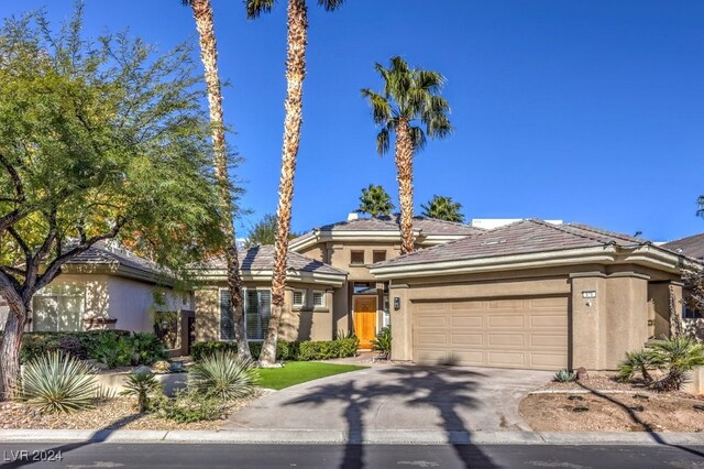 view of front of property with a garage