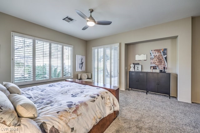 bedroom with ceiling fan and carpet