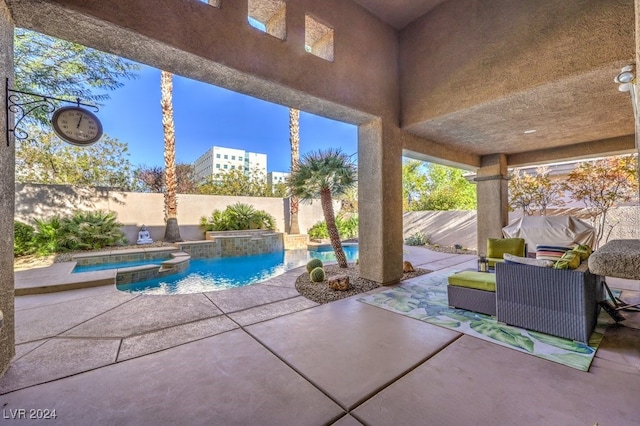 view of patio / terrace with a swimming pool with hot tub, an outdoor hangout area, and grilling area