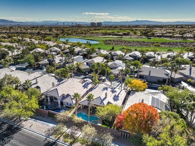 bird's eye view featuring a water and mountain view