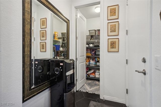 interior space with dark tile patterned floors