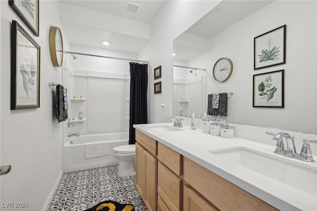 full bathroom featuring tile patterned flooring, shower / bath combo, vanity, and toilet