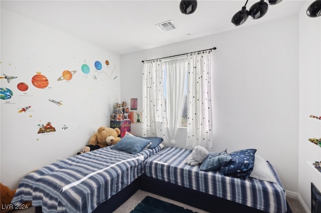 bedroom featuring carpet flooring