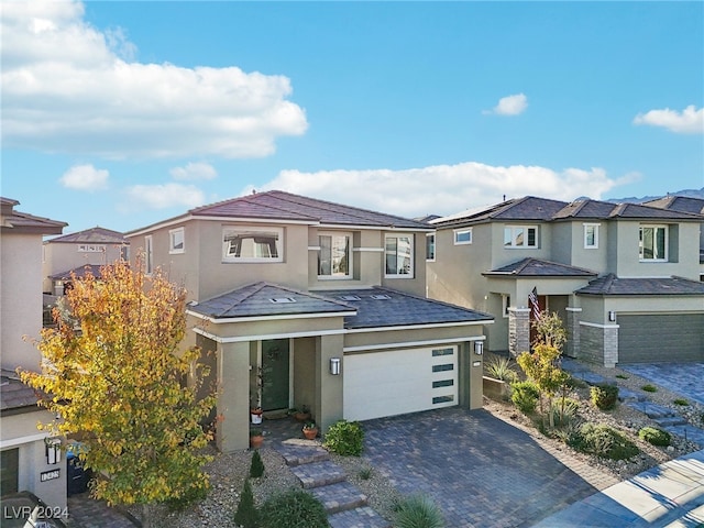 view of front of property featuring a garage