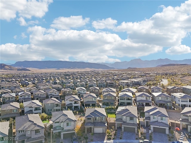 drone / aerial view featuring a mountain view