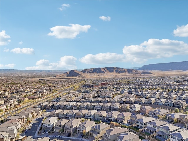 drone / aerial view featuring a mountain view