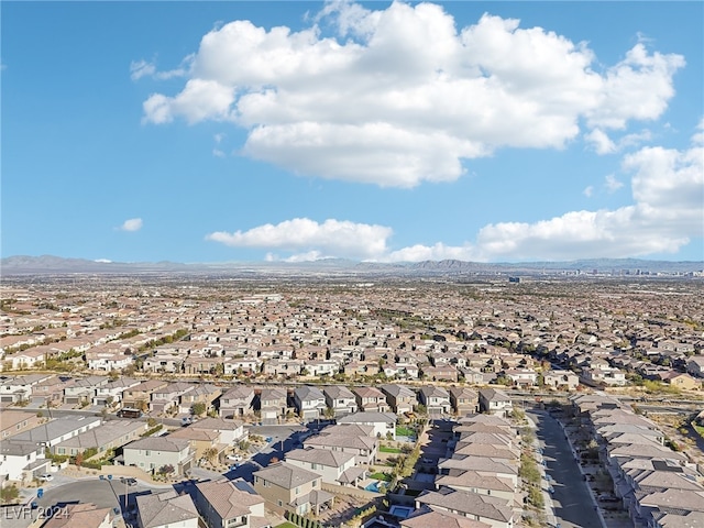 drone / aerial view featuring a mountain view